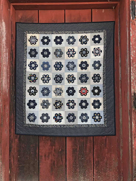Indigo Haiku, hand-stitched applique, hand-quilted, hexie quilt by Robin Atkins, bead artist