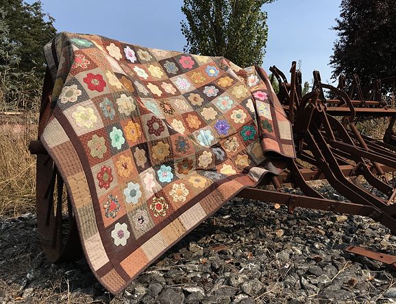 Simply Peaceful, hand-stitched applique, hand-quilted,  hexie quilt by Robin Atkins, bead artist