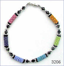 Subtle rainbow bracelet by Robin Atkins, bead artist.