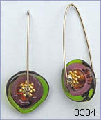 Violet-olivine earrings by Robin Atkins, bead artist.