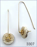 Fossilized shell earrings by Robin Atkins, bead artist.