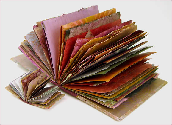 Book of Plenty and Mini Prayer Book, hand made books featuring painted decorative papers, large picture, by Robin Atkins, bead artist