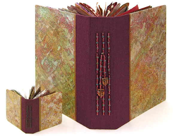 Book of Plenty and Mini Prayer Book, hand made books featuring painted decorative papers, large picture, by Robin Atkins, bead artist